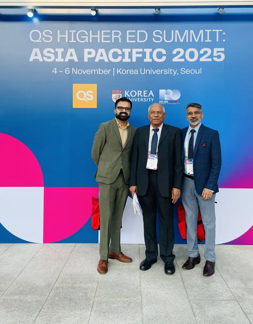 With colleagues at the QS summit, November 2025 · Korea University, Seoul